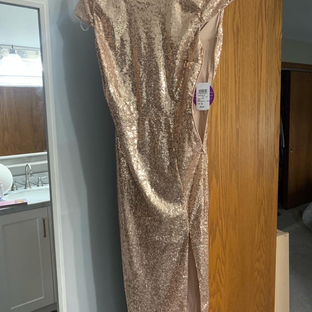 Rosegold size small scoop back dress from Windsor. Brand new never worn